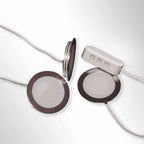 Slimline floor lighting kit with LED bulbs on a gray surface
