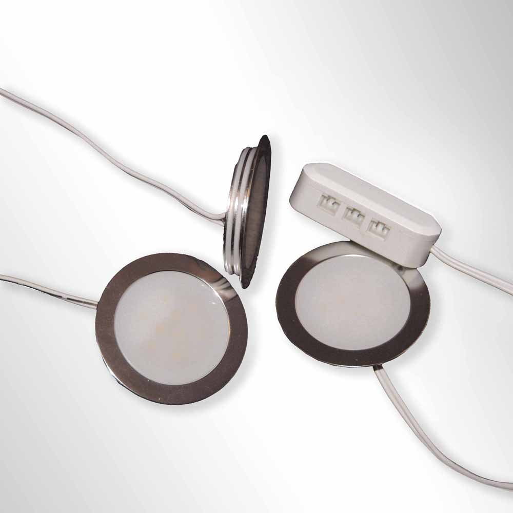 Slimline floor lighting kit with LED bulbs on a gray surface