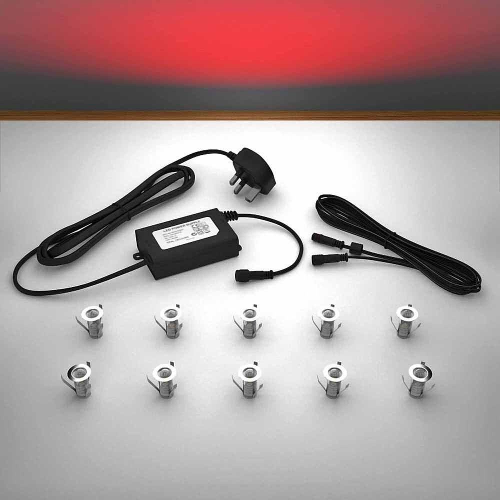 Lighting kit with 18mm red LED bulbs and power adapter on a gray surface