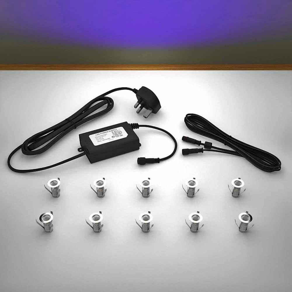 Lighting kit with 18mm UV LED bulbs and power adapter on a gray surface