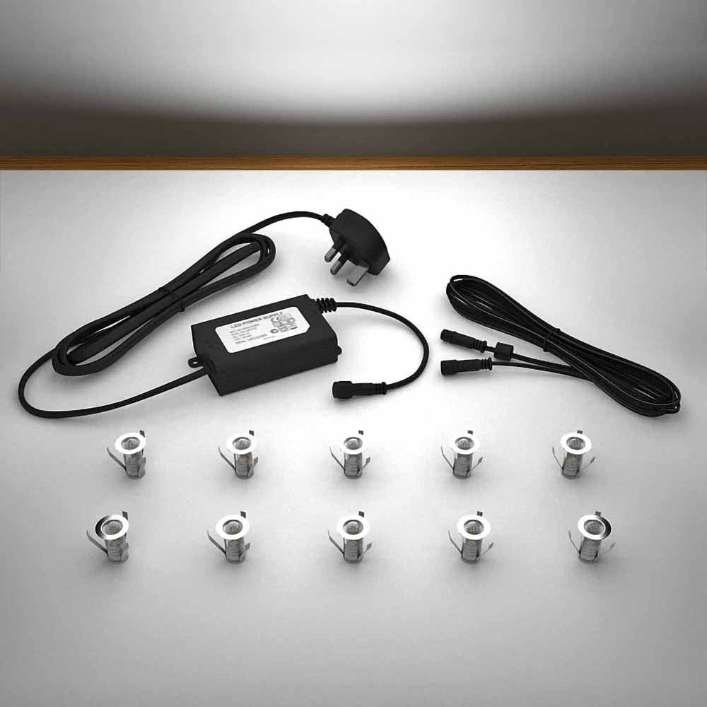 Lighting kit with 18mm white LED bulbs and power adapter on a gray surface