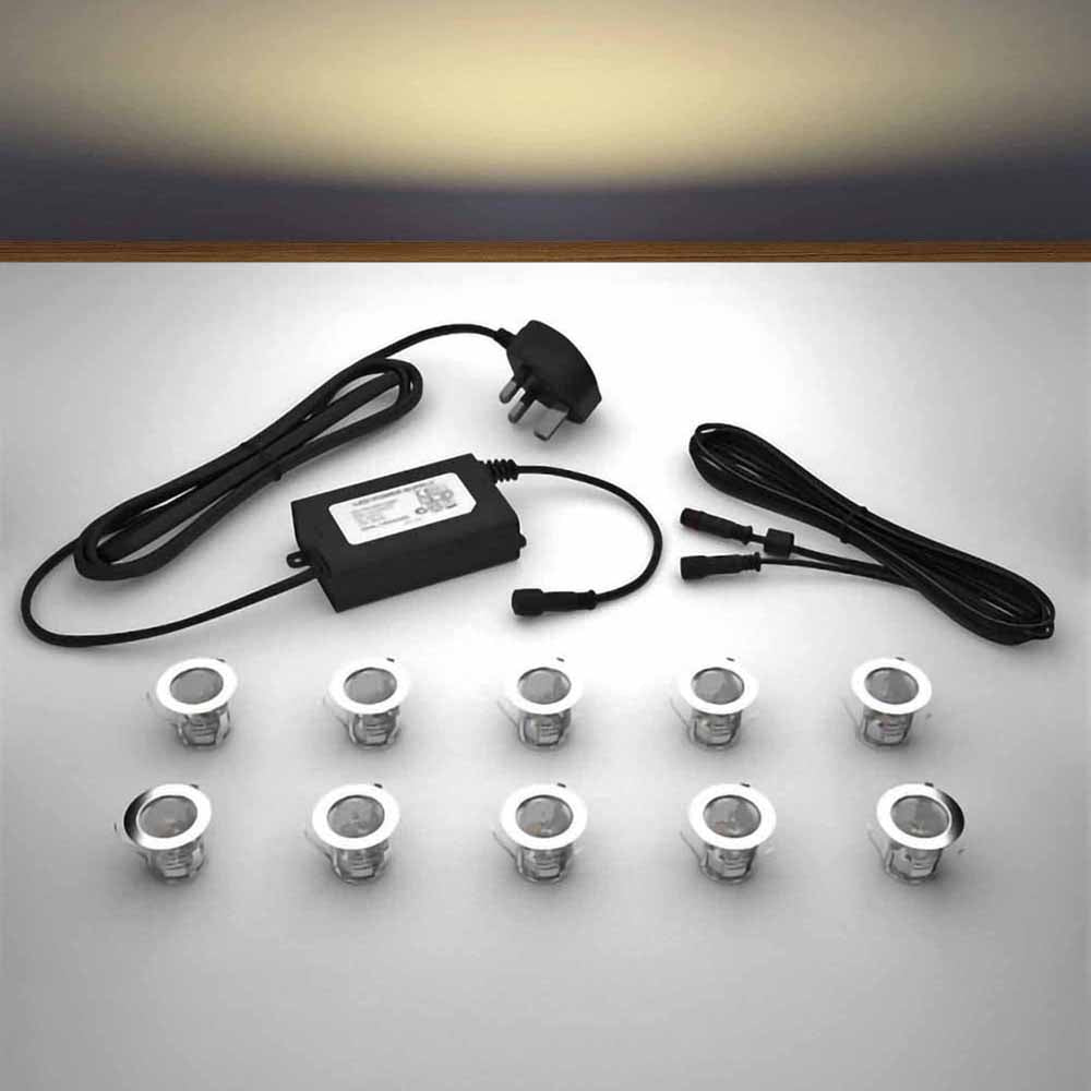 Lighting kit with 30mm warm white LED bulbs and power adapter on a gray surface