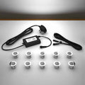 Lighting kit with 30mm white LED bulbs and power adapter on a gray surface