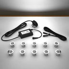 Lighting kit with 30mm white LED bulbs and power adapter on a gray surface