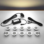 Lighting kit with 45mm warm white LED bulbs and power adapter on a gray surface