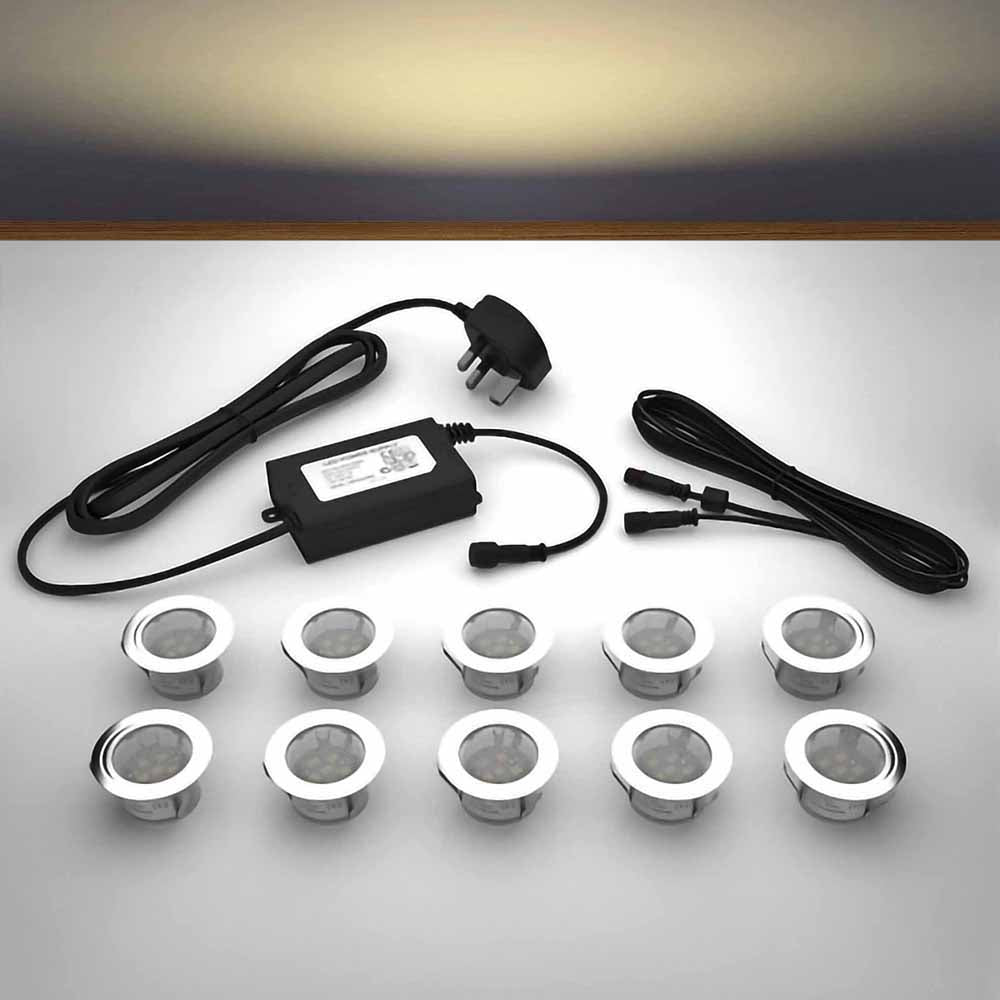 Lighting kit with 45mm warm white LED bulbs and power adapter on a gray surface