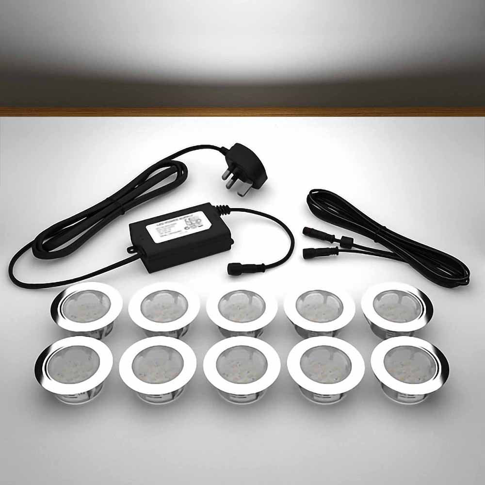 Lighting kit with 60mm white LED bulbs and power adapter on a gray surface