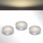 Slimline floor lighting kit with warm white LED bulbs on a gray surface