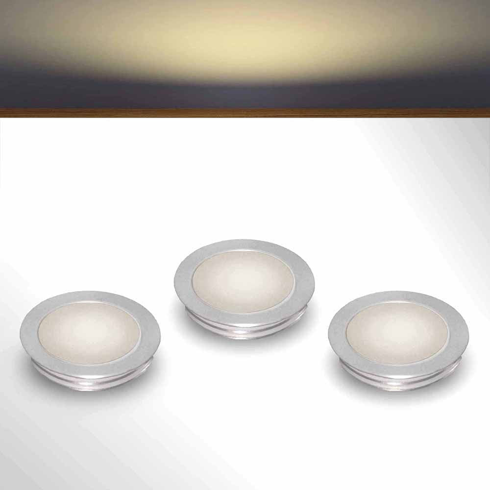Slimline floor lighting kit with warm white LED bulbs on a gray surface