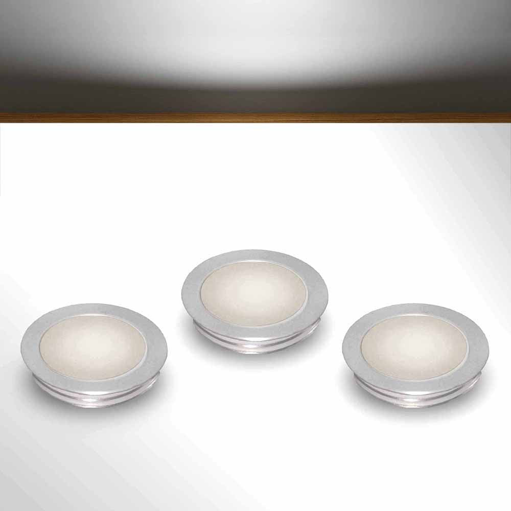Slimline floor lighting kit with white LED bulbs on a gray surface