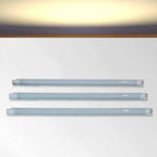 Three LED kitchen cabinet warm white strip lights on a white background