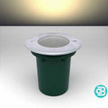 Warm white LED in ground light fixture on a gray background
