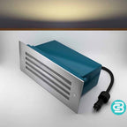 Slatted warm white LED wall light with a black cable on a gray background