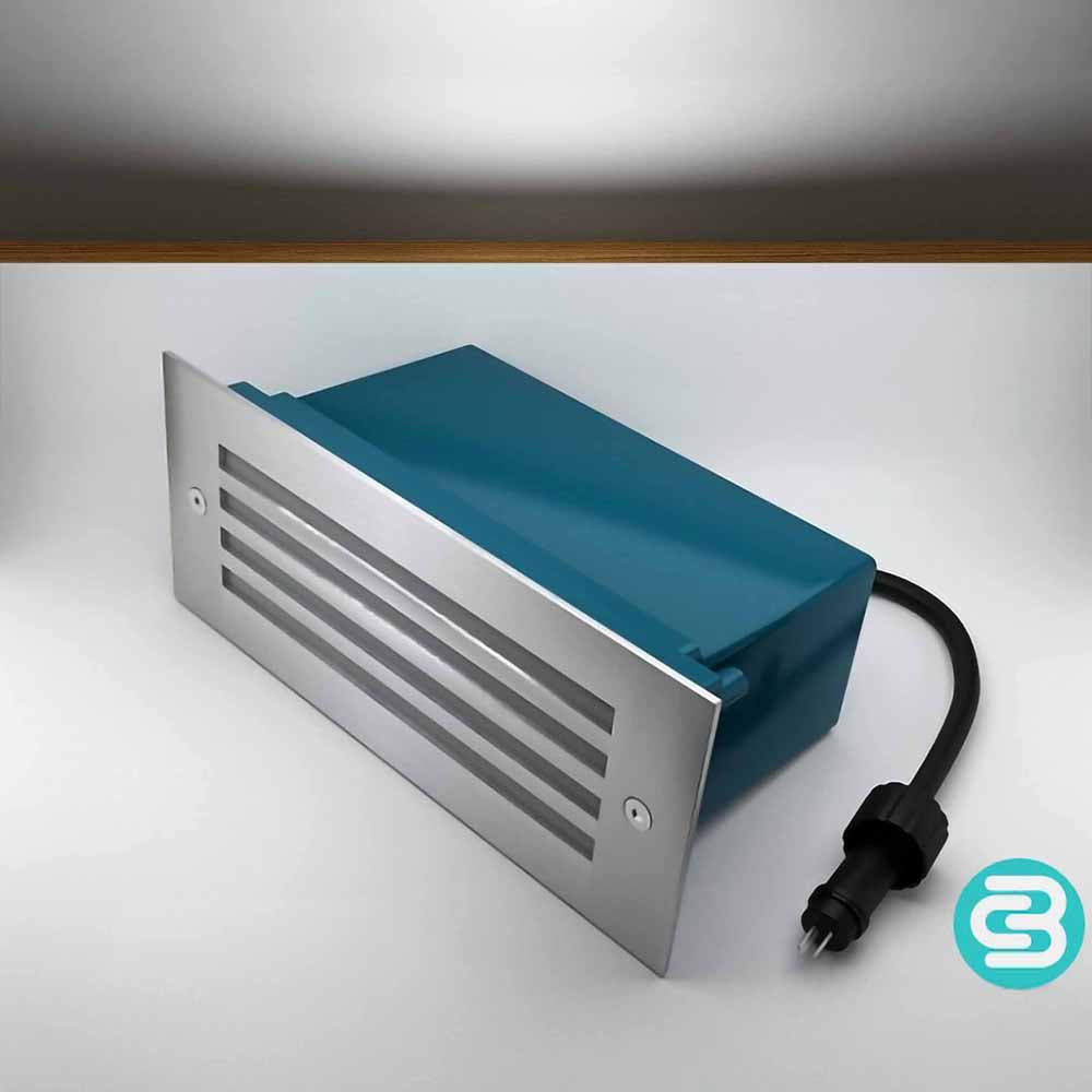 Slatted white LED wall light with a black cable on a gray background