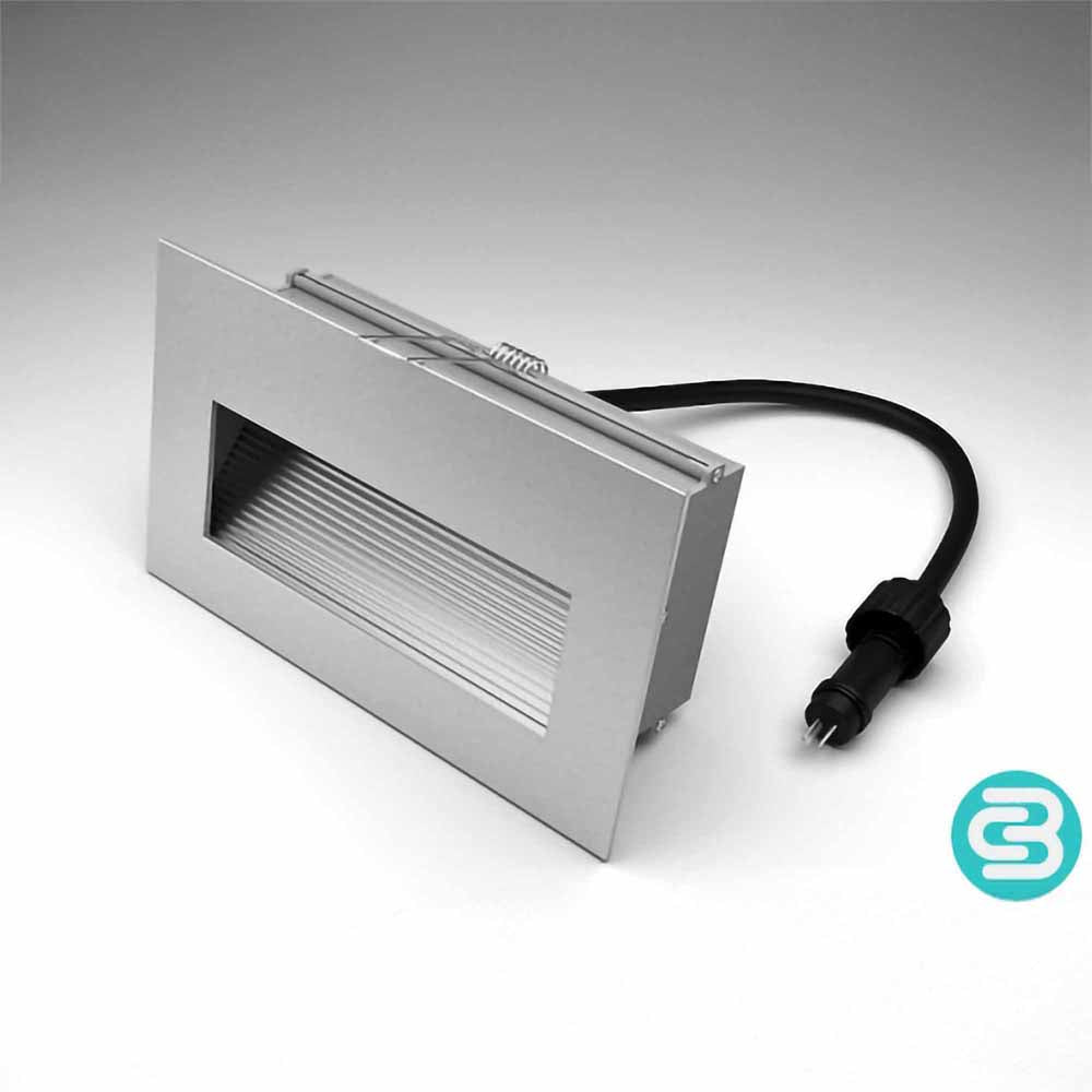LED wall downlight with a black cable on a gray background
