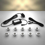 Domed lighting kit with 30mm warm white LED bulbs and power adapter on a gray surface