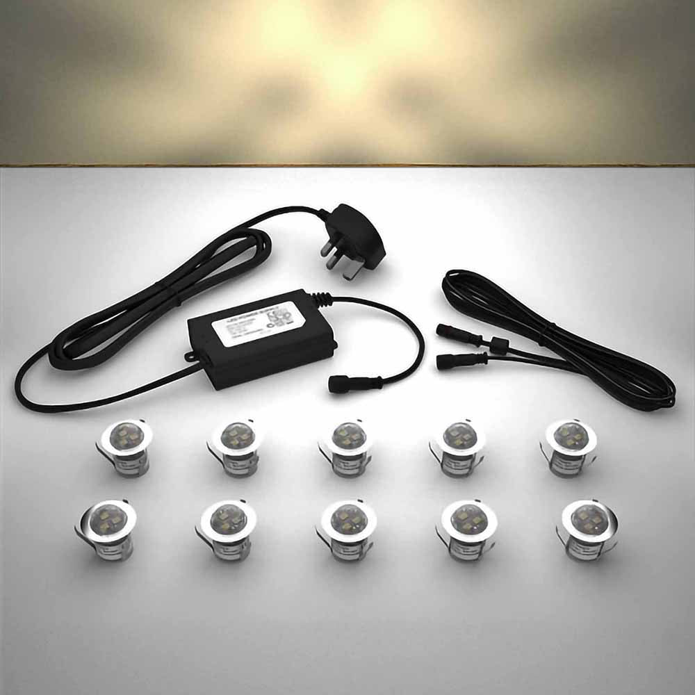 Domed lighting kit with 30mm warm white LED bulbs and power adapter on a gray surface