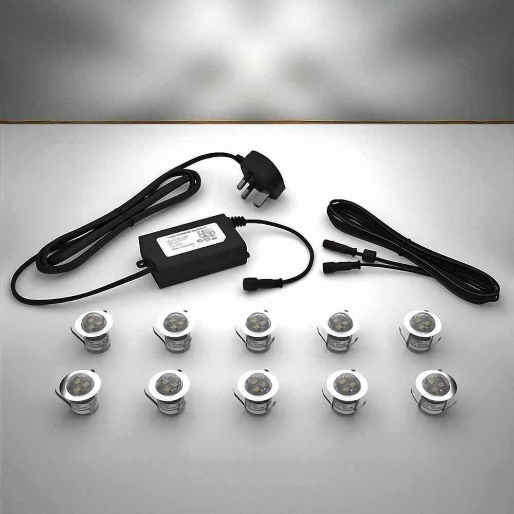 Domed lighting kit with 30mm white LED bulbs and power adapter on a gray surface