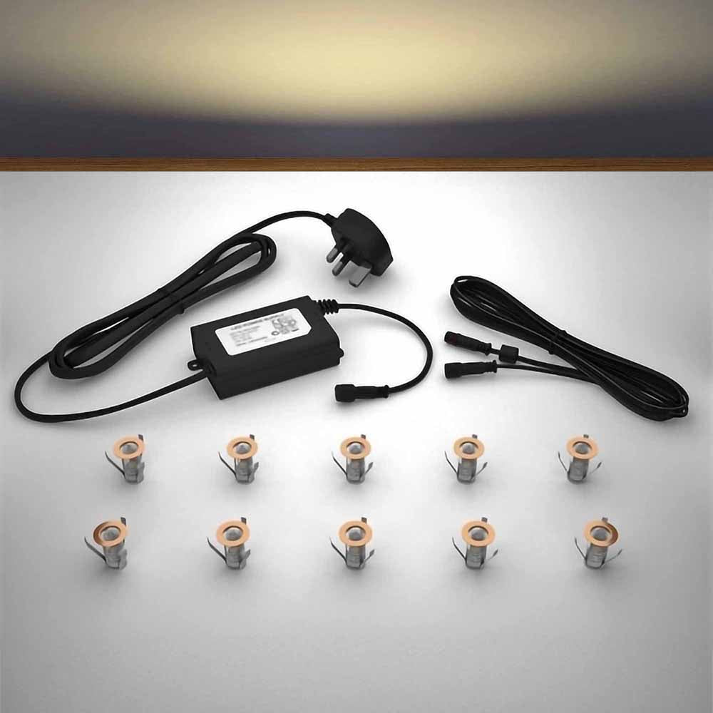 Copper lighting kit with 18mm warm white LED bulbs and power adapter on a gray surface