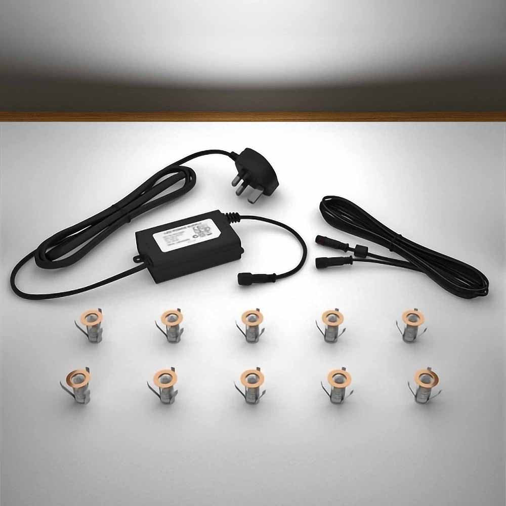 Copper lighting kit with 18mm white LED bulbs and power adapter on a gray surface