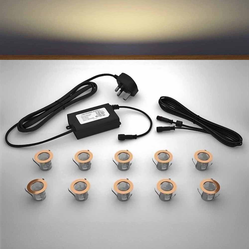 Copper lighting kit with 30mm warm white LED bulbs and power adapter on a gray surface