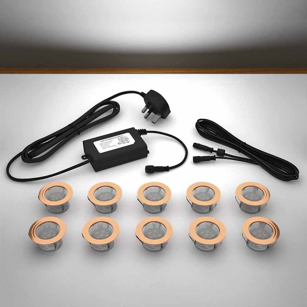 Copper lighting kit with 45mm white LED bulbs and power adapter on a gray surface