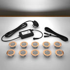 Copper lighting kit with 45mm white LED bulbs and power adapter on a gray surface