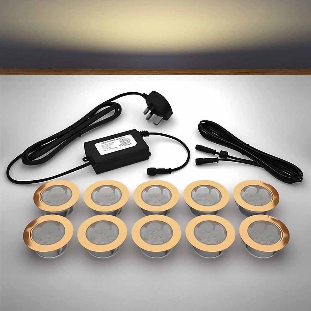 Copper lighting kit with 60mm warm white LED bulbs and power adapter on a gray surface