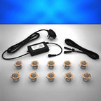 Copper domed lighting kit with 30mm blue LED bulbs and power adapter on a gray surface
