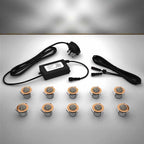 Copper domed lighting kit with 30mm white LED bulbs and power adapter on a gray surface