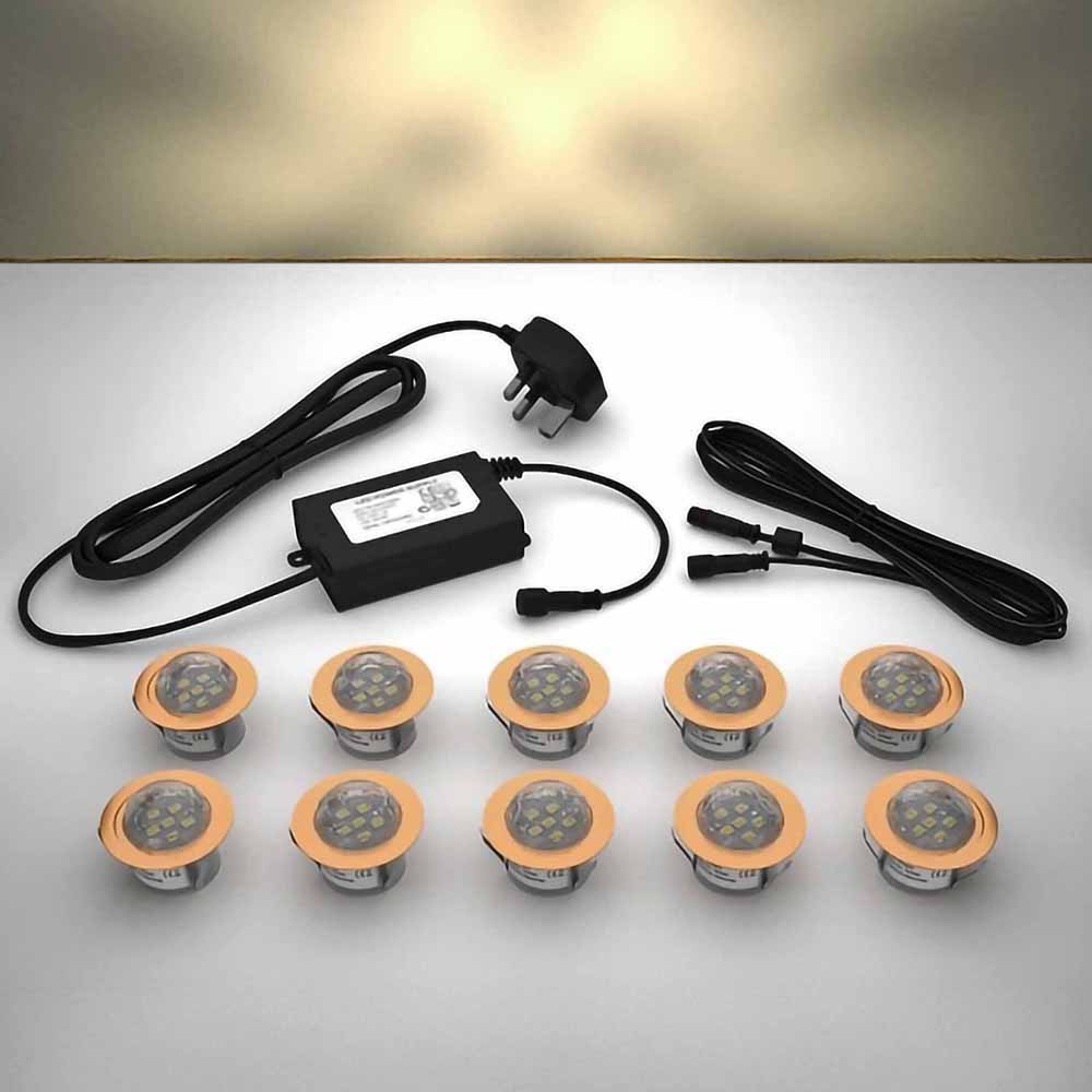 Copper domed lighting kit with 45mm warm white LED bulbs and power adapter on a gray surface