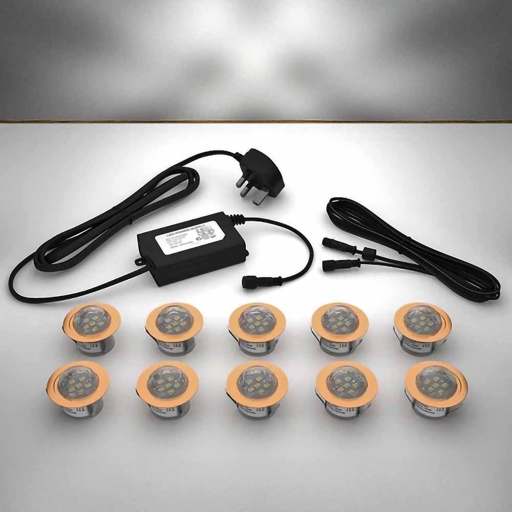 Copper domed lighting kit with 45mm white LED bulbs and power adapter on a gray surface